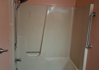 before Threshold Environmental Accessibility Adaptations on a bathtub
