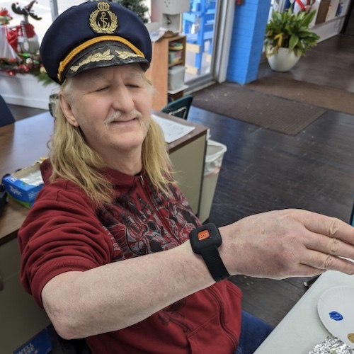 man wearing smart watch